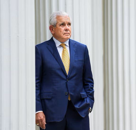 Tom Carse, founding attorney of Champions Firm, standing before classical columns